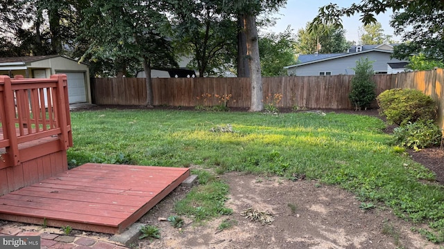 7209 Halifax Pl, Springfield, VA 22150 - view of yard with a deck, a garage, and an outbuilding