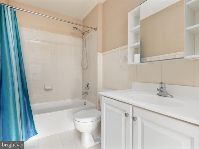 6040 Gayleburg Pl, Gainesville, VA 20155 - bathroom with shower / bath combination with curtain, vanity, toilet, wainscoting, and tile patterned floors