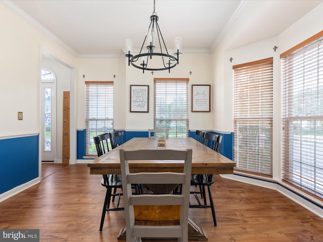 6040 Gayleburg Pl, Gainesville, VA 20155 - dining space with a chandelier, healthy amount of natural light, crown molding, and wood finished floors