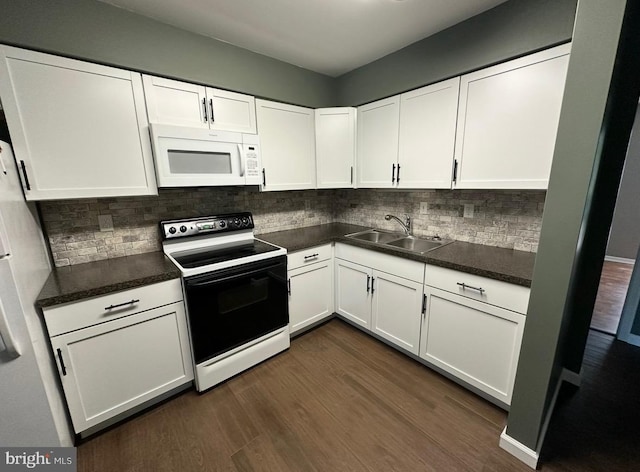 1004 Brinker Dr, Hagerstown, MD 21740 - kitchen featuring white microwave, range with electric cooktop, a sink, and white cabinets
