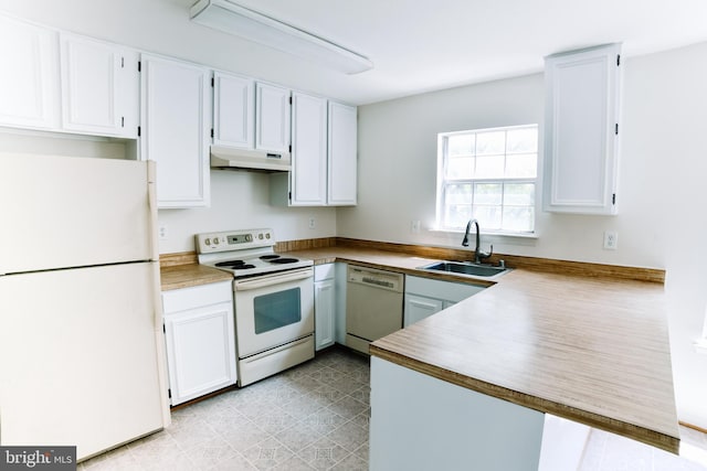 10256 Quiet Pond Ter, Burke, VA 22015 - kitchen featuring white appliances, under cabinet range hood, a sink, and white cabinetry