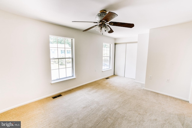 10256 Quiet Pond Ter, Burke, VA 22015 - spare room featuring a ceiling fan, carpet, and baseboards