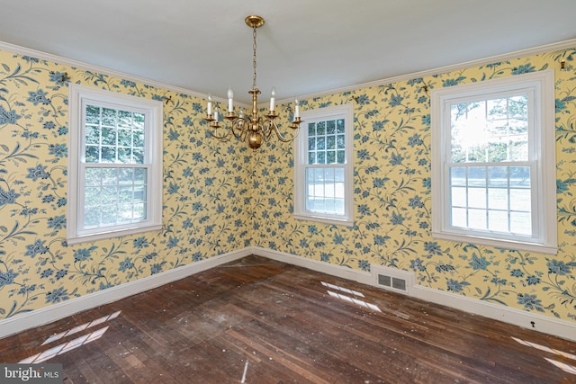 100 Carson Rd, Princeton, NJ 08540 - unfurnished dining area with dark wood-style floors, a chandelier, baseboards, plenty of natural light, and crown molding