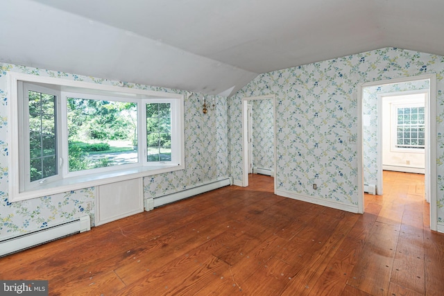 100 Carson Rd, Princeton, NJ 08540 - additional living space featuring vaulted ceiling, baseboard heating, wallpapered walls, wood finished floors, and a baseboard heating unit