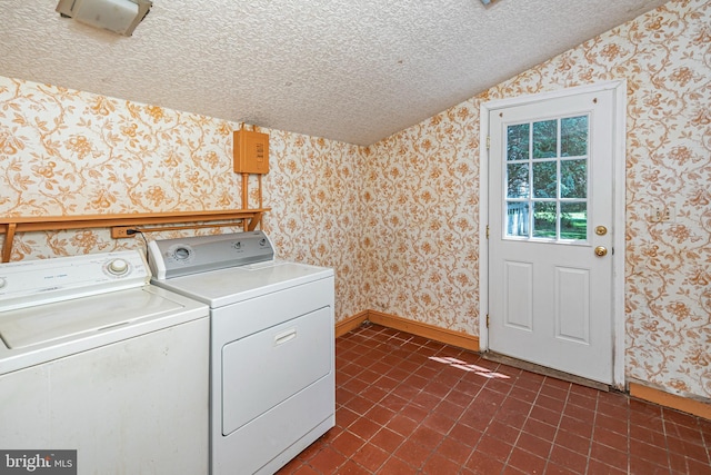 100 Carson Rd, Princeton, NJ 08540 - washroom with wallpapered walls, washer and dryer, a textured ceiling, baseboards, and dark tile patterned floors