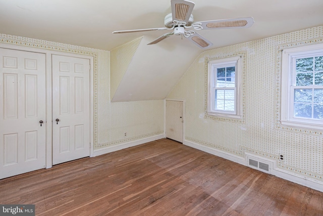 100 Carson Rd, Princeton, NJ 08540 - additional living space featuring wood finished floors, ceiling fan, healthy amount of natural light, lofted ceiling, and wallpapered walls
