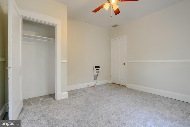 5919 Sefton Ave, Baltimore, MD 21214 - unfurnished bedroom with carpet floors, baseboards, a closet, ceiling fan, and heating unit