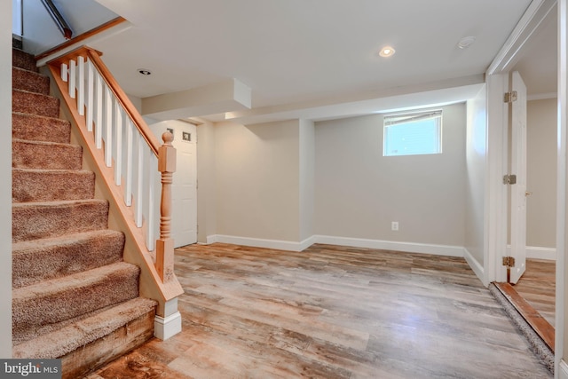 5919 Sefton Ave, Baltimore, MD 21214 - below grade area with light wood-style flooring, baseboards, stairs, and recessed lighting