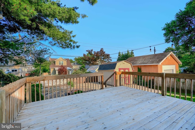 5919 Sefton Ave, Baltimore, MD 21214 - wooden deck featuring a garage