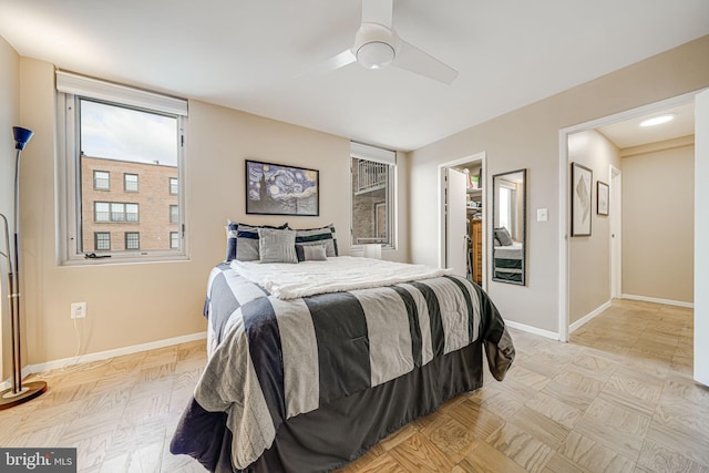 2800 Wisconsin Ave NW Unit 504, Washington, DC 20007 - bedroom featuring baseboards, ceiling fan, and a spacious closet