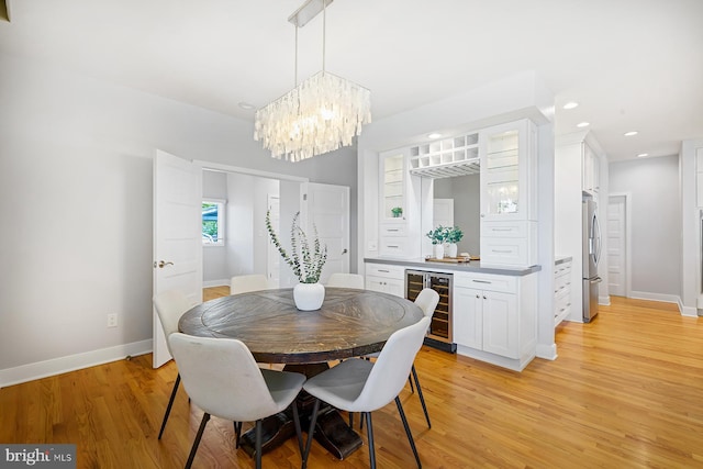 3442 Rockway Ave, Annapolis, MD 21403 - dining space with beverage cooler, light wood-type flooring, baseboards, a chandelier, and recessed lighting