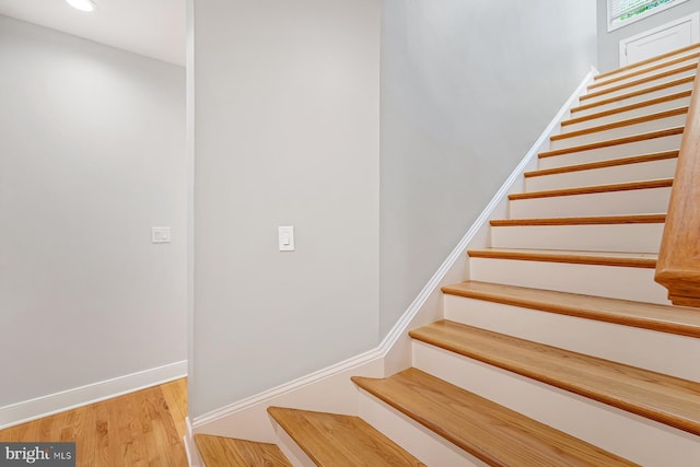 3442 Rockway Ave, Annapolis, MD 21403 - staircase with wood finished floors, baseboards, and recessed lighting