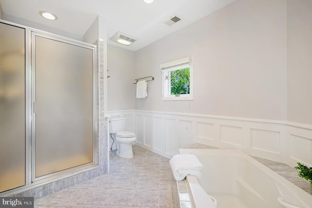 3442 Rockway Ave, Annapolis, MD 21403 - bathroom with a shower stall, a wainscoted wall, a garden tub, toilet, and a decorative wall