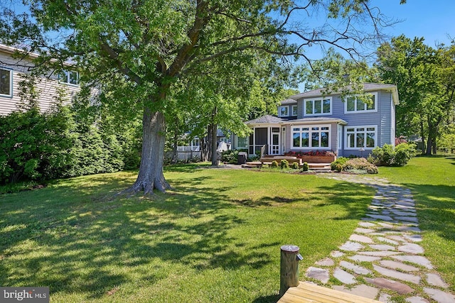 3442 Rockway Ave, Annapolis, MD 21403 - view of green lawn with a sunroom