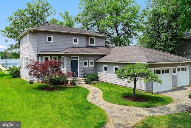 3442 Rockway Ave, Annapolis, MD 21403 - view of front facade featuring a garage, a front yard, a shingled roof, and driveway