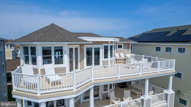 1107 Ocean Ave, Brigantine, NJ 08203 - back of house featuring a shingled roof