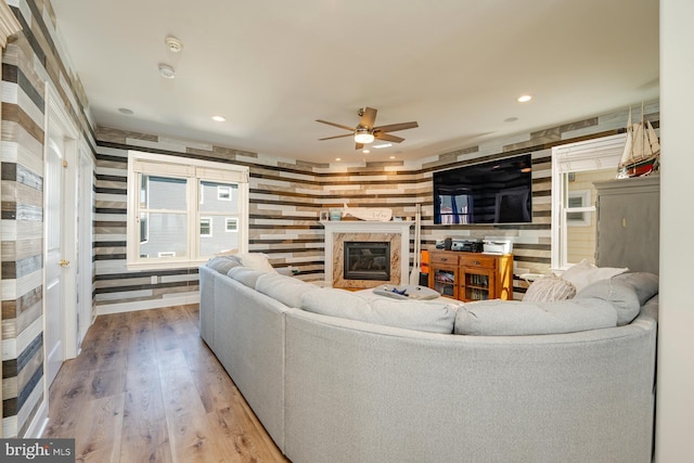 1107 Ocean Ave, Brigantine, NJ 08203 - living area featuring ceiling fan, wood finished floors, recessed lighting, and a premium fireplace
