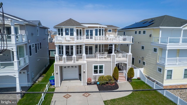 1107 Ocean Ave, Brigantine, NJ 08203 - view of front of property featuring an attached garage and concrete driveway
