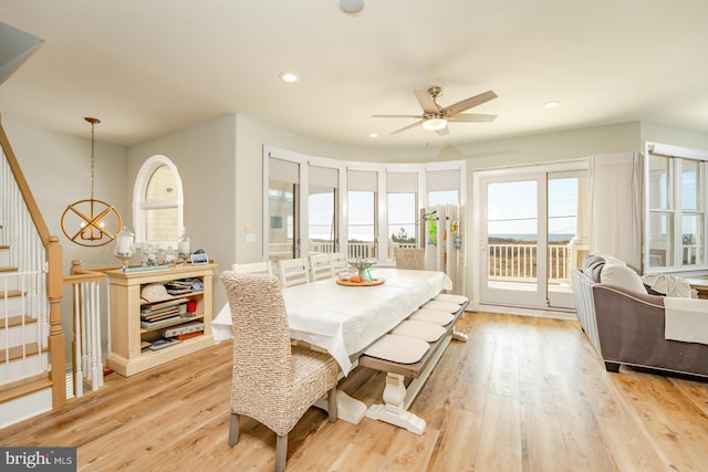 1107 Ocean Ave, Brigantine, NJ 08203 - dining room featuring ceiling fan, light wood-style flooring, recessed lighting, and a chandelier