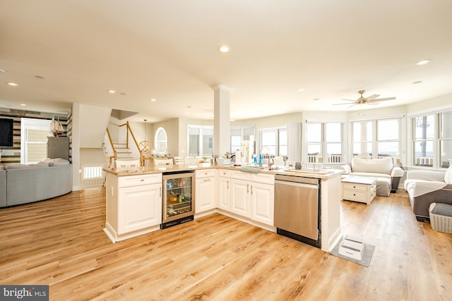 1107 Ocean Ave, Brigantine, NJ 08203 - kitchen featuring open floor plan, beverage cooler, stainless steel dishwasher, light wood-style flooring, and recessed lighting