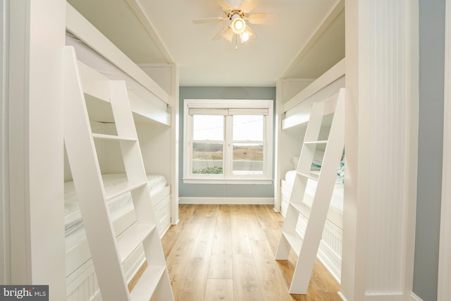 1107 Ocean Ave, Brigantine, NJ 08203 - walk in closet with light wood finished floors and ceiling fan