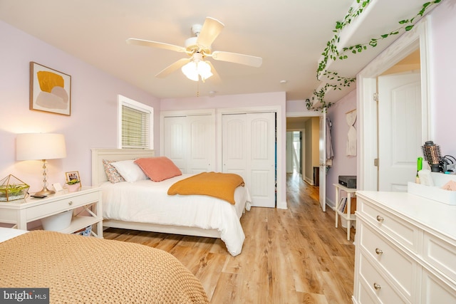 1107 Ocean Ave, Brigantine, NJ 08203 - bedroom with multiple closets, light wood-style floors, and ceiling fan