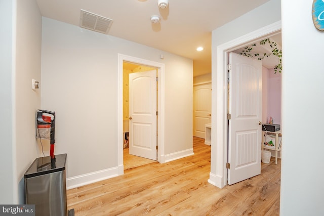 1107 Ocean Ave, Brigantine, NJ 08203 - hallway featuring light wood finished floors, baseboards, and recessed lighting