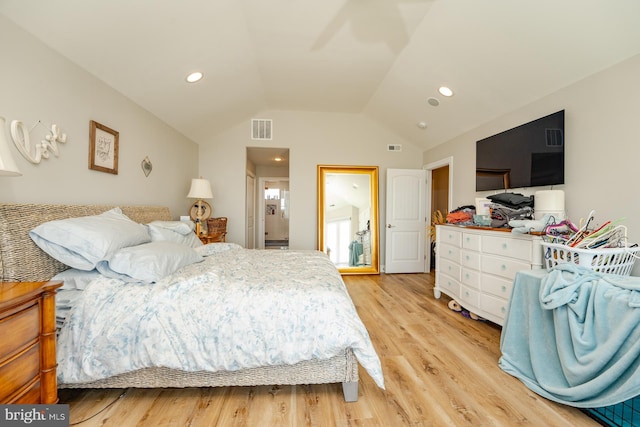 1107 Ocean Ave, Brigantine, NJ 08203 - bedroom with vaulted ceiling, light wood-style floors, and recessed lighting