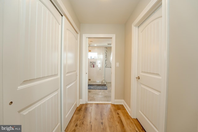 1107 Ocean Ave, Brigantine, NJ 08203 - corridor featuring light wood-type flooring and baseboards