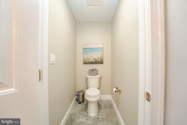 1107 Ocean Ave, Brigantine, NJ 08203 - bathroom featuring toilet, baseboards, and tile patterned flooring