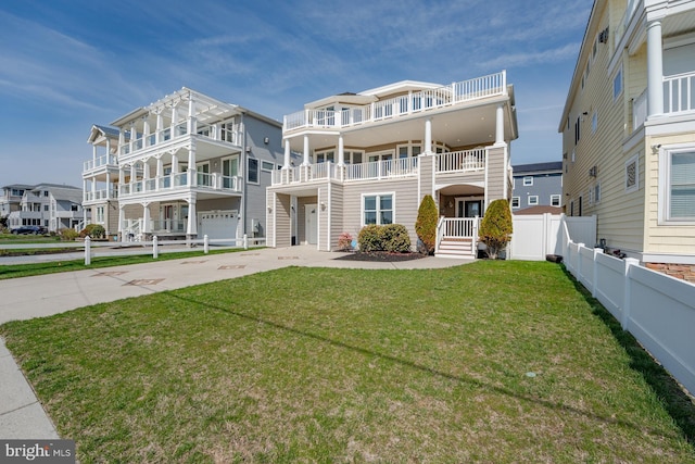 1107 Ocean Ave, Brigantine, NJ 08203 - view of front facade featuring driveway and a garage