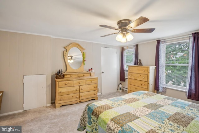 137 2nd St, Bordentown, NJ 08505 - bedroom featuring light carpet, crown molding, a ceiling fan, and a baseboard heating unit