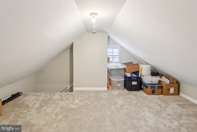 137 2nd St, Bordentown, NJ 08505 - bonus room with lofted ceiling, carpet floors, and baseboards
