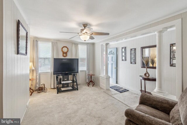 137 2nd St, Bordentown, NJ 08505 - carpeted living room featuring ornate columns, a ceiling fan, and ornamental molding