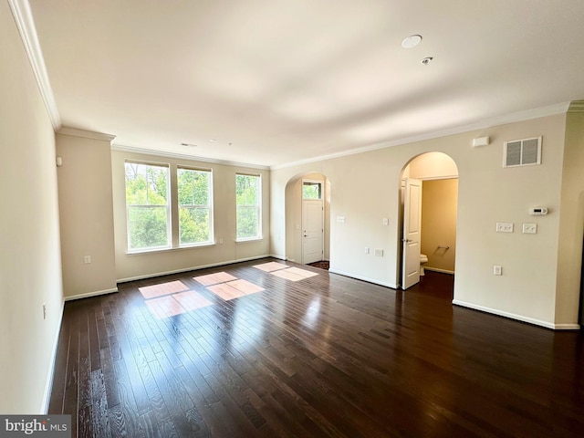 6967 Country Club Ter, New Market, MD 21774 - spare room featuring arched walkways, ornamental molding, dark wood-style floors, baseboards, and a pendent fire sprinkler
