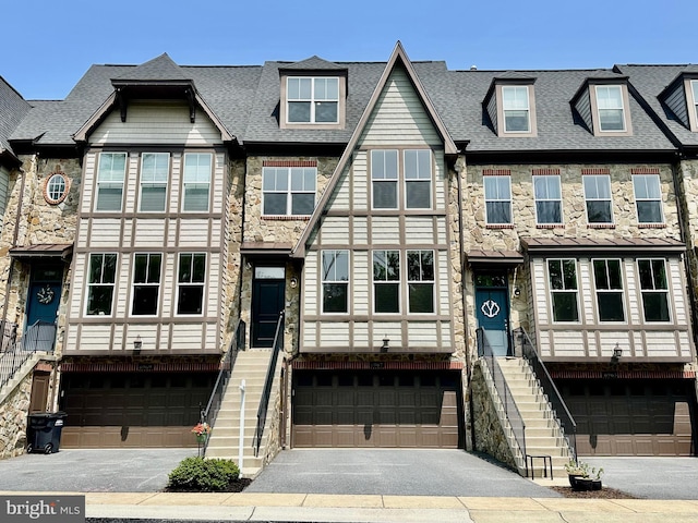 6967 Country Club Ter, New Market, MD 21774 - view of property with a garage, asphalt driveway, and stairway