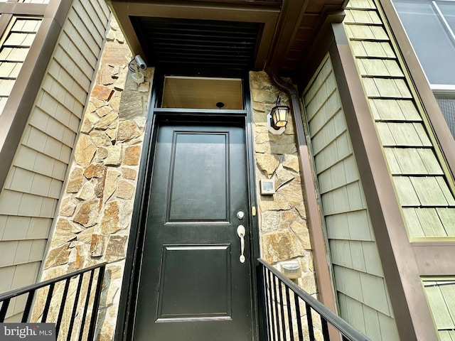 6967 Country Club Ter, New Market, MD 21774 - view of exterior entry with a security system