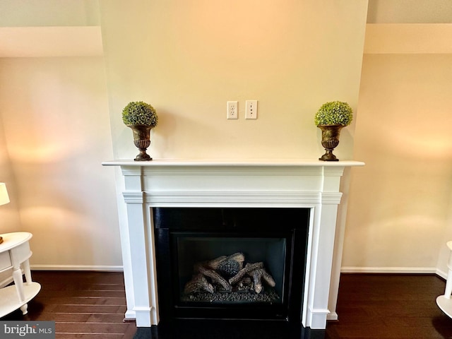 6967 Country Club Ter, New Market, MD 21774 - detailed view of a fireplace with flush hearth, wood finished floors, and baseboards