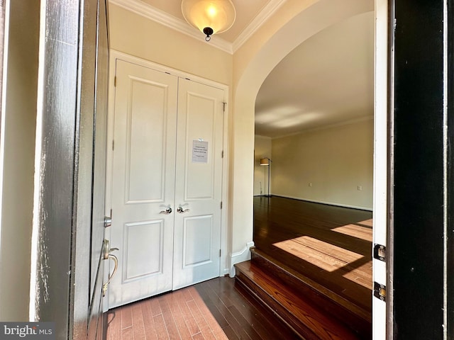 6967 Country Club Ter, New Market, MD 21774 - entrance foyer with arched walkways, wood finished floors, ornamental molding, and baseboards