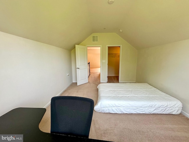 6967 Country Club Ter, New Market, MD 21774 - carpeted bedroom with vaulted ceiling, baseboards, and a walk in closet