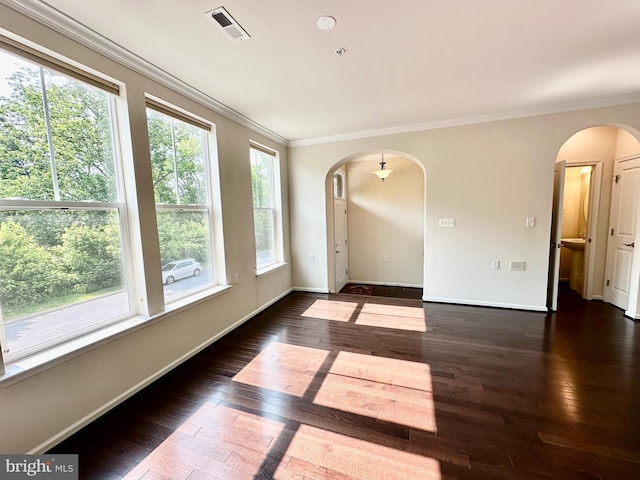 6967 Country Club Ter, New Market, MD 21774 - unfurnished room featuring arched walkways, plenty of natural light, crown molding, and wood-type flooring