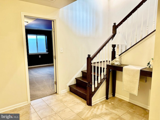 6967 Country Club Ter, New Market, MD 21774 - staircase with baseboards, tile patterned floors, and carpet floors