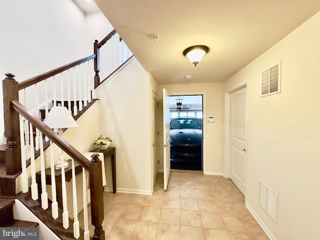6967 Country Club Ter, New Market, MD 21774 - entryway featuring stairs, baseboards, and light tile patterned floors