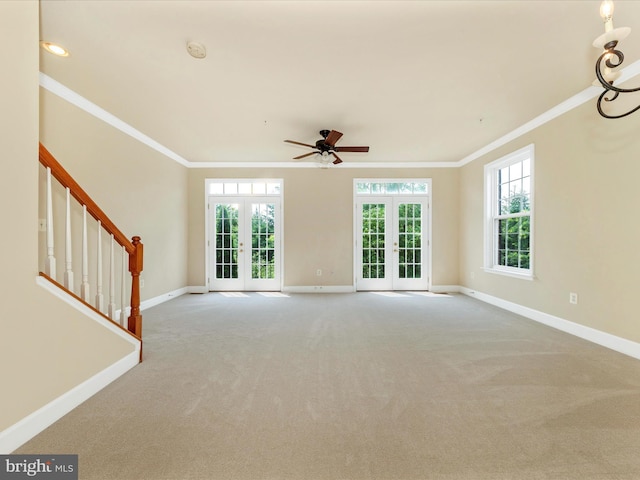 739 Hidden Marsh St, Gaithersburg, MD 20877 - unfurnished living room with french doors, ornamental molding, baseboards, carpet flooring, and ceiling fan