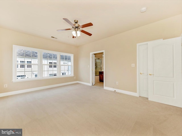 739 Hidden Marsh St, Gaithersburg, MD 20877 - unfurnished bedroom with light carpet, baseboards, ensuite bath, and ceiling fan
