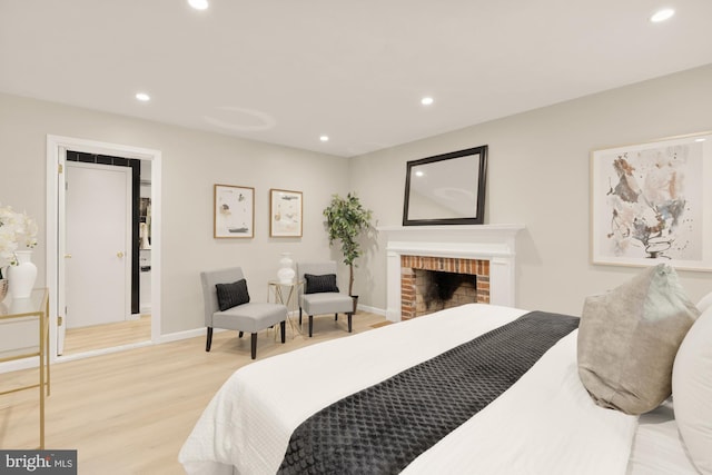 5404 Nedra Ave, Alexandria, VA 22310 - bedroom with recessed lighting, light wood-style floors, baseboards, and a fireplace