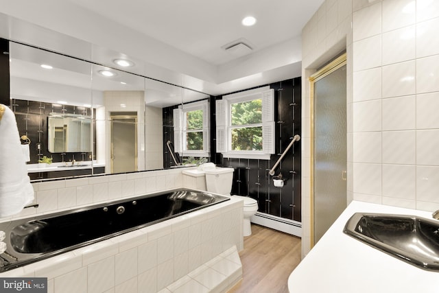 5404 Nedra Ave, Alexandria, VA 22310 - full bath with a baseboard radiator, vanity, a jetted tub, a stall shower, and toilet