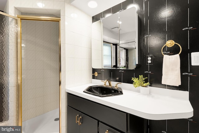 5404 Nedra Ave, Alexandria, VA 22310 - full bath featuring vanity, a stall shower, and tile walls