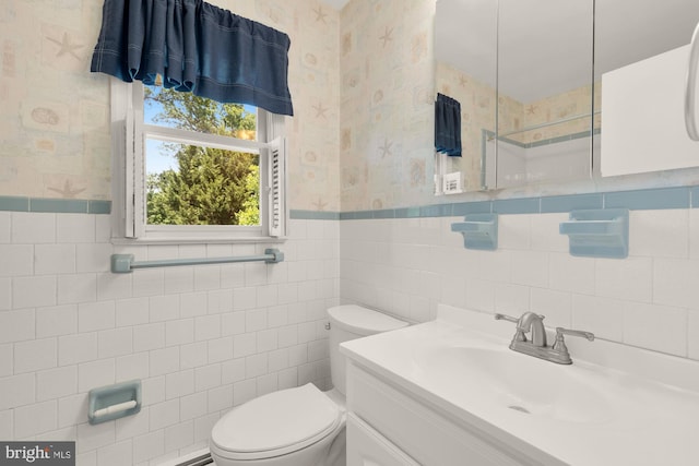 5404 Nedra Ave, Alexandria, VA 22310 - full bathroom featuring wallpapered walls, tile walls, toilet, vanity, and a wainscoted wall