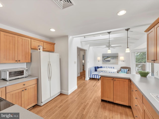 2054 Buckskin Cv, Auburn, PA 17922 - kitchen featuring freestanding refrigerator, ceiling fan, light countertops, light wood-style flooring, and recessed lighting